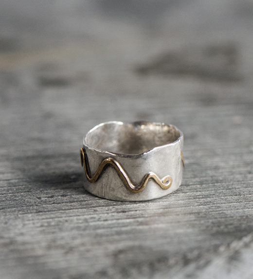 Sterling silver and 14kt gold mountain ring